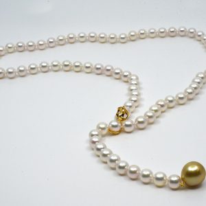 Japanese Akoya pearl lariat with a Golden South Sea drop