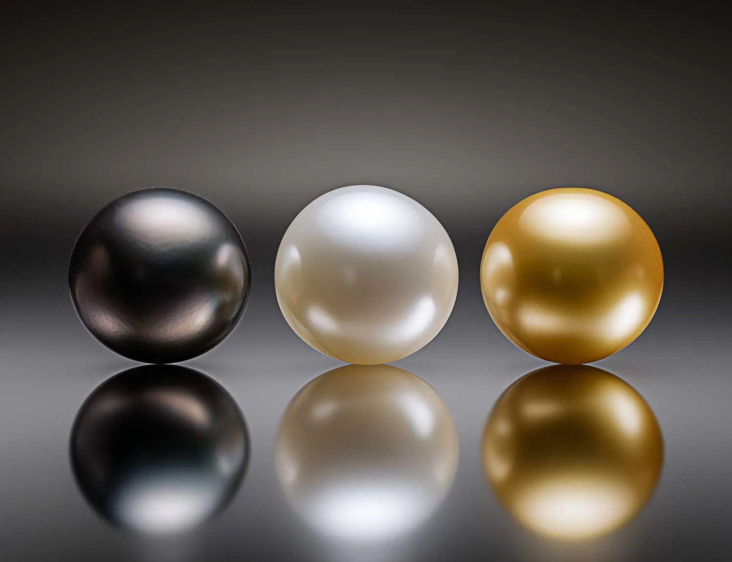 Loose pearls spread across a Tokyo sorting table
